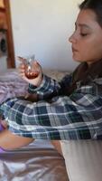 Enjoying a Contemplative Moment with a Drink in a Cozy Setting to Reflect and Relax video