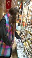 Exploring the vibrant marketplace filled with artisan goods and colorful selections some more video