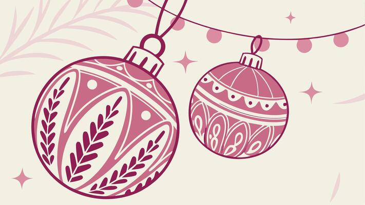 Two pink christmas balls hanging from a string