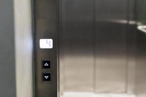Elevator buttons panel close up photo