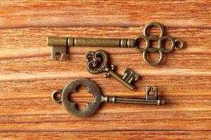 old key on wooden table photo