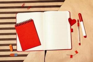 Notebook open page design on table photo
