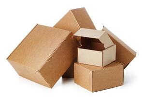 Stacked brown cardboard boxes in various sizes arranged on a white background photo