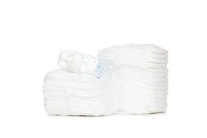 Stack of diapers isolated on white background photo