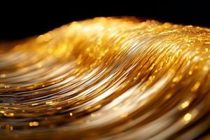 A close up of a gold plate with a black background photo