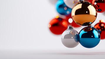 A bunch of colorful christmas ornaments hanging from a string photo