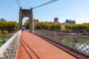 Old Passerelle du College bridge over Rhone river in Lyon, France photo