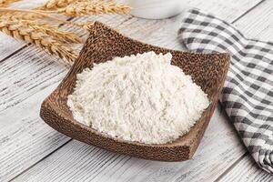 Wheat flour heap for bake photo