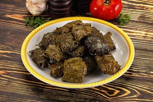 Stuffed dolma - meat in grape leaves photo