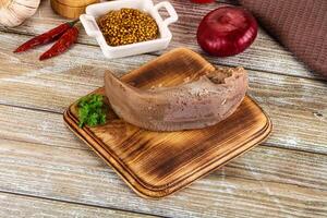 Steamed pork tongue with mustard photo