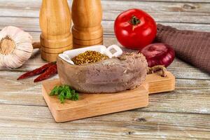 Steamed pork tongue with mustard photo