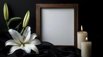 A black photo frame with a burning candle and a white lily on a table in a funeral home, symbolizing grief, remembrance, and a heartfelt tribute to the departed.