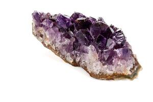 Amethyst Crystal Druse macro mineral on white background photo
