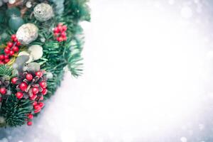 Christmas wreath isolated on a white snow background photo