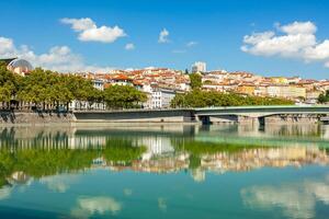 Cityscape of Lyon, France with reflections in the water photo