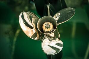 two boat engine with propeller details shot photo
