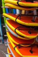 Surf boards in a stack photo
