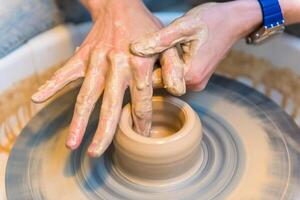Pottering - creating a clay cup in process photo