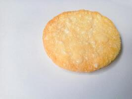 Stack of Japanese rice crackers, Sembei isolated on white background photo