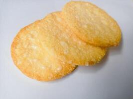 Stack of Japanese rice crackers, Sembei isolated on white background photo