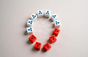 Collapse of a group or team. People leaving, relationships and connections being broken. Violation of subordination and the need to reform the group. Dismissal of workers. Loss of trust in the team. photo