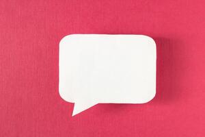 Symbol sign message from a white paper on a red background, social network, message, symbol photo