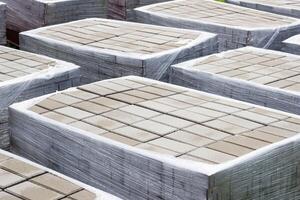 pallets with a paving slab made of mortar, brick, paving brick photo