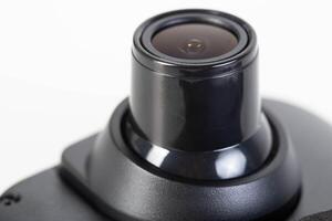DVR camera eye on a white background, maximum recording resolution and frame rate. Car mirror with recorder. photo