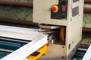 Production of pvc windows, gluing of plastic corners of windows, machine for the production of pvc windows, profile photo