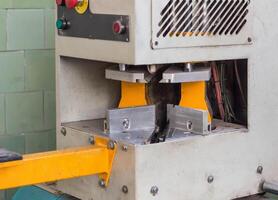 Production of pvc windows, gluing of plastic corners of windows, machine for the production of pvc windows photo