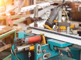 Production of PVC windows, a machine for drilling holes in the frame pvc, drill tool photo
