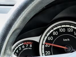 car dashboard with speedometer close up view photo