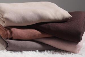 Pile of hijabs in soft colors isolated on a white background. Hijab mockup and high resolution photos. photo