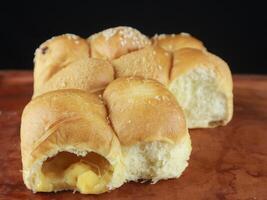 Homemade wheat bread with sesame seeds and cheese photo