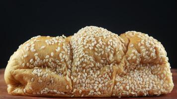 Homemade wheat bread with sesame seeds and cheese photo