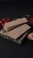 Rectangular whole grain crisp bread with cream cheese for a hearty, nutritious breakfast video