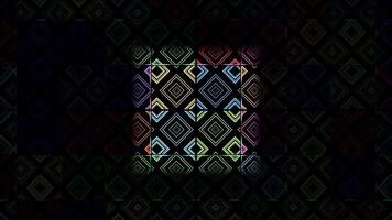 Colorful geometric patterns dance in sync with vibrant beats at night video