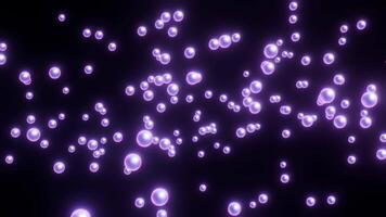 Mesmerizing purple bubbles floating in a dark space for creative VJ loops video