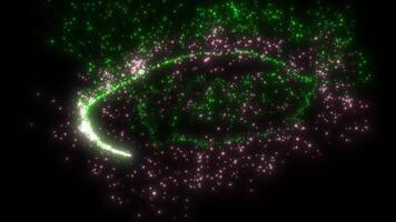 A magical beam of pink-green color from luminous particles draws fancy patterns. Comet, magic, abstraction, fireworks. Background video