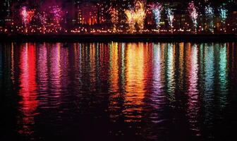 A city skyline with fireworks in the background photo