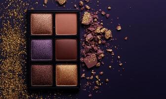 A palette of eyeshadow colors soft lavender, warm rose, deep bronze, and light gold shimmer, with a subtle gold confetti effect photo