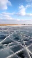 Ice forms patterns on the frozen lake surface , wallpaper photo