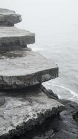 Stone platforms extending from cliff edges , photorealistic wallpaper photo
