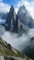Peaks emerge through fog layers in a mountain chain sequence, wallpaper art photo