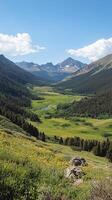 Valleys curve between ridges toward peaks in the background vista, wallpaper art photo