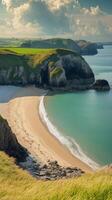 Beach curves toward headland where cliffs meet the ocean, photorealistic wallpaper photo