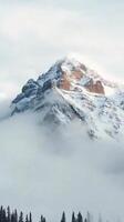 Peaks emerge through fog layers in a mountain chain sequence, photorealistic photo