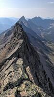 Range extends toward the horizon showing multiple summit levels, photorealistic wallpaper photo