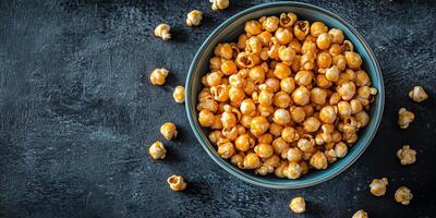 Bowl filled with kettle corn, with individual kernels showing an even coating, culinary photography photo