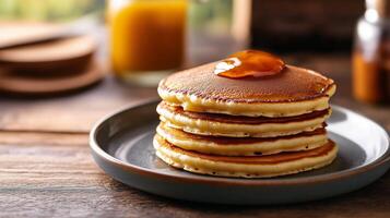 Breakfast plate with a stack of three round buttermilk pancakes, culinary photography photo